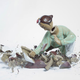 Illustration for article titled Incredible photographs capture the body-shattering war of the porcelain people